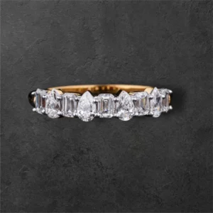 Pear And Emerald Cut Half Eternity Ring