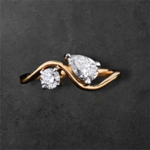 Round And Pear Diamond Toi Et Moi Ring