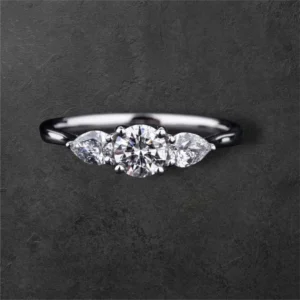 Round Diamond Ring With Pear Side Stones